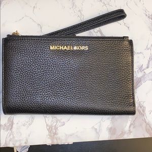 Black pebbled leather wristlet